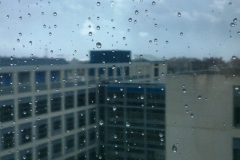 Rainy drops on my office window glass.
